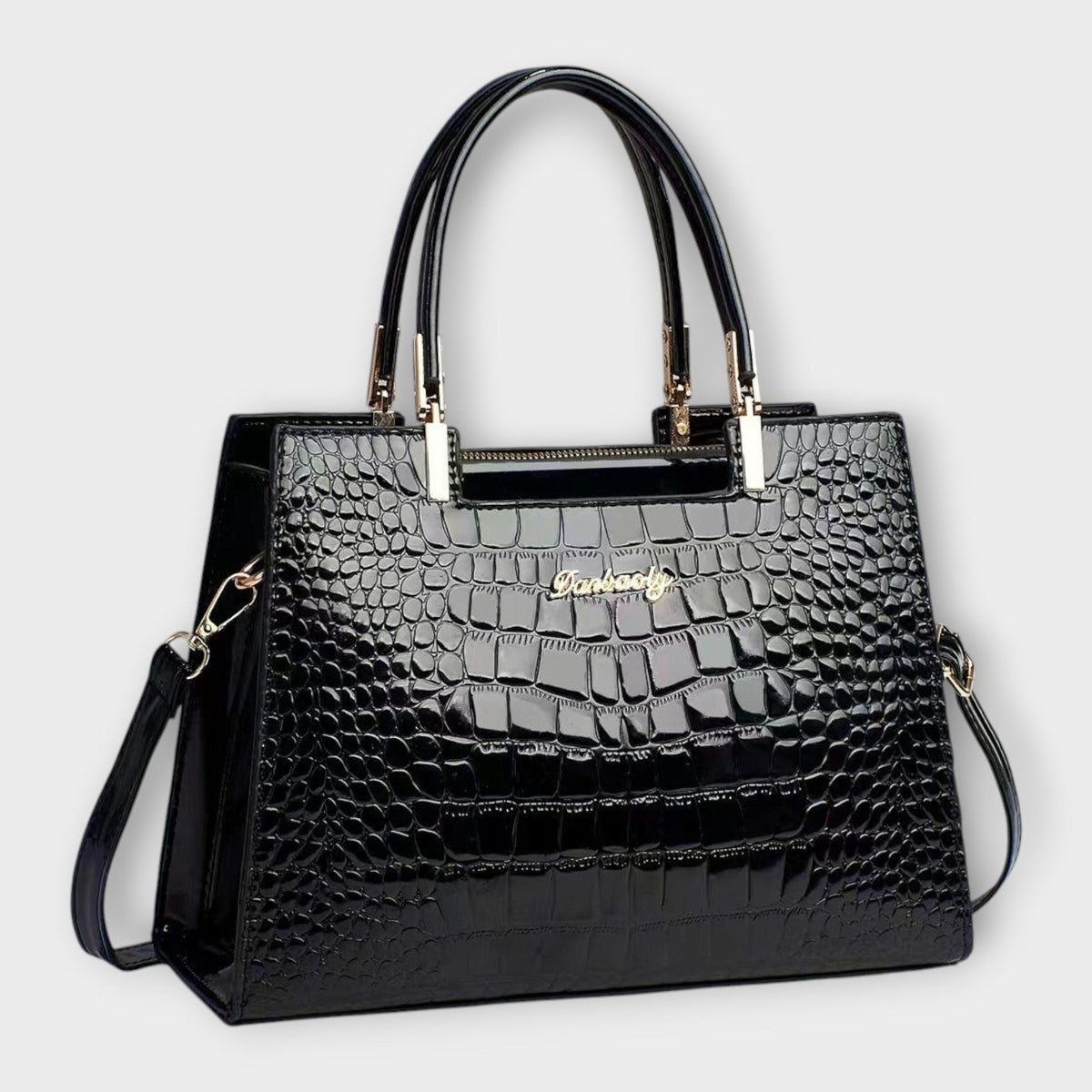 Glänzende Krokodilleder-Handtasche