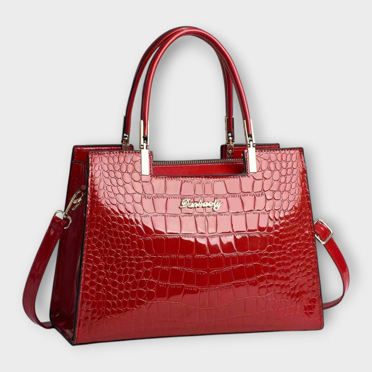 Glänzende Krokodilleder-Handtasche