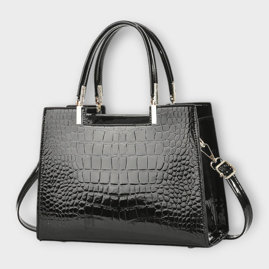 Glänzende Krokodilleder-Handtasche